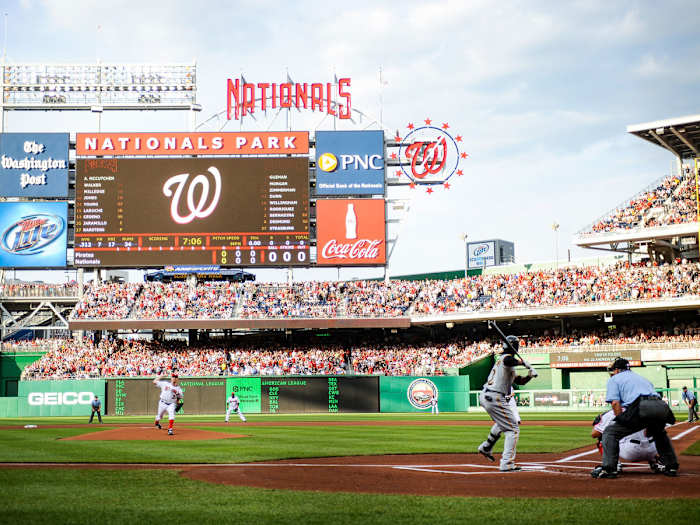 Stephen Strasburg throws his first major league pitch.